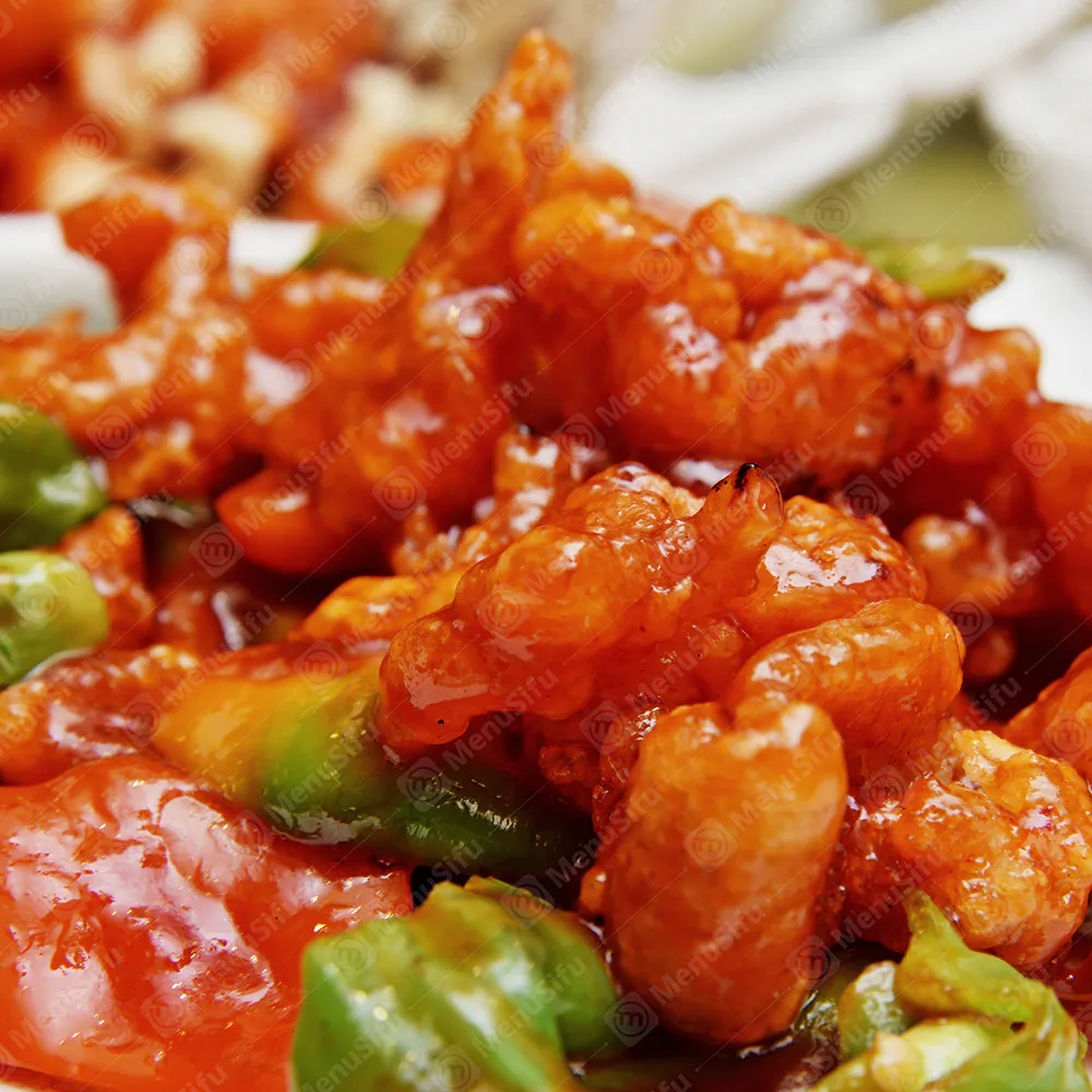 Crispy chicken in sweet and spicy sauce with bell peppers at Renbox Asian Kitchen, a Chinese Restaurant in Katy